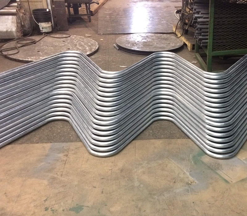 Atlas Industries Services - custom CNC Tube and pipe Bending for custom shapes